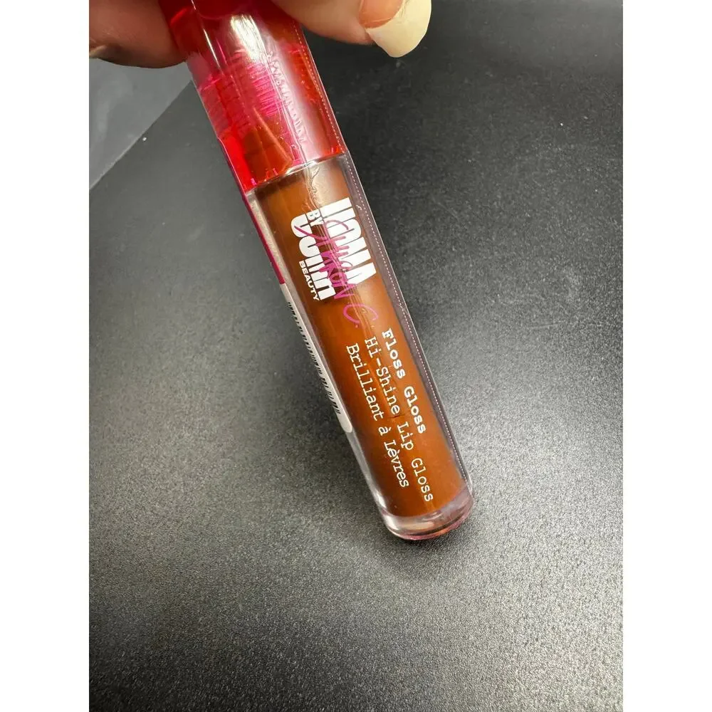 NWT UOMA High Shine Lip Gloss in shade Edible SEALED NO BOX